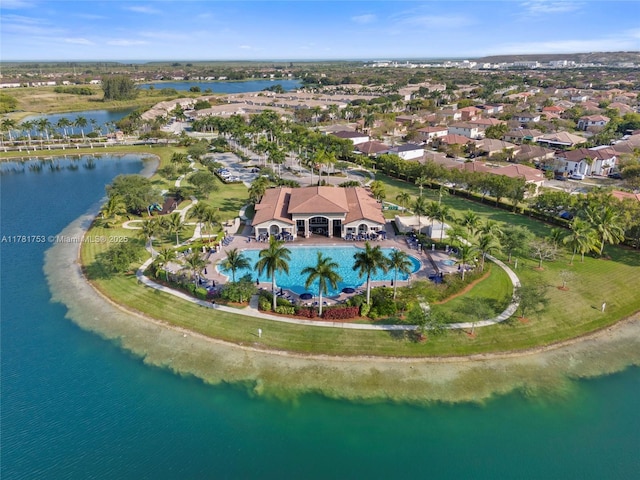 birds eye view of property with a water view and a residential view