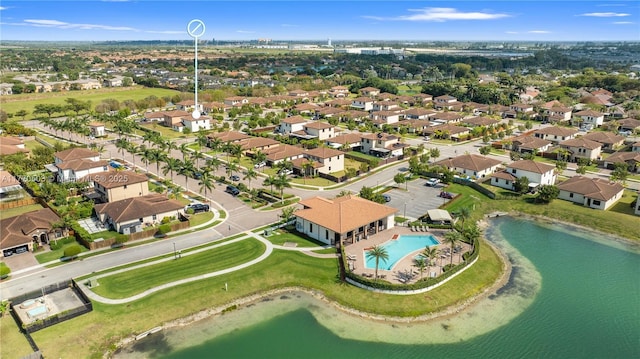 aerial view featuring a water view and a residential view