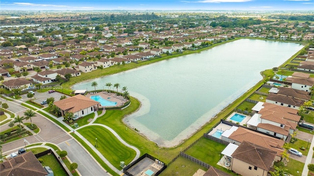 aerial view with a water view and a residential view