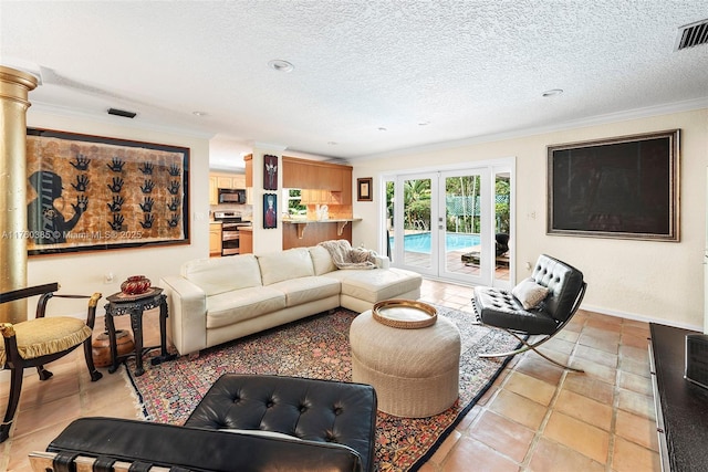 1414 Ferdinand St, Coral Gables, FL 33134 - living room featuring french doors, ornamental molding, visible vents, and a textured ceiling