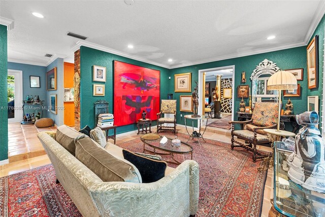 1414 Ferdinand St, Coral Gables, FL 33134 - tiled living room featuring recessed lighting, visible vents, a textured ceiling, and ornamental molding