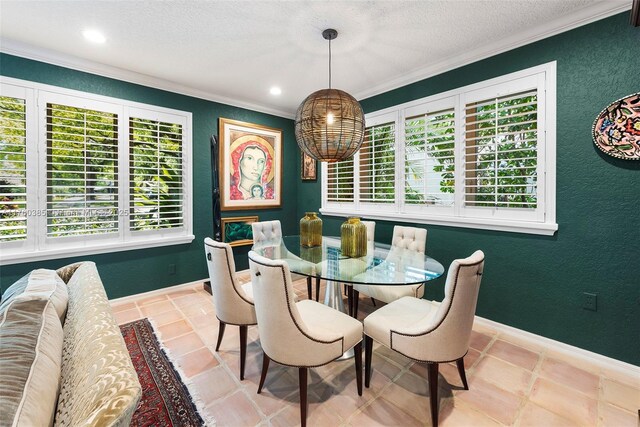 1414 Ferdinand St, Coral Gables, FL 33134 - dining area with baseboards, a textured wall, a textured ceiling, crown molding, and tile patterned floors