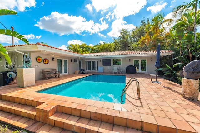 1414 Ferdinand St, Coral Gables, FL 33134 - pool with french doors, ceiling fan, and a patio
