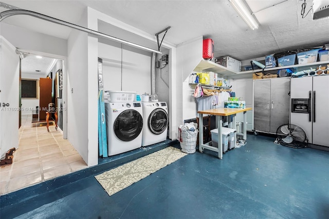 1414 Ferdinand St, Coral Gables, FL 33134 - laundry area with independent washer and dryer, laundry area, and a garage