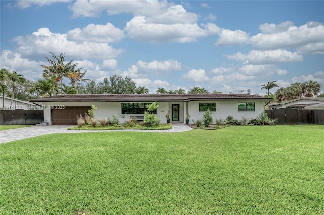 8360 SW 148th Dr, Palmetto Bay, FL 33158 - ranch-style house featuring a garage, stucco siding, fence, and concrete driveway