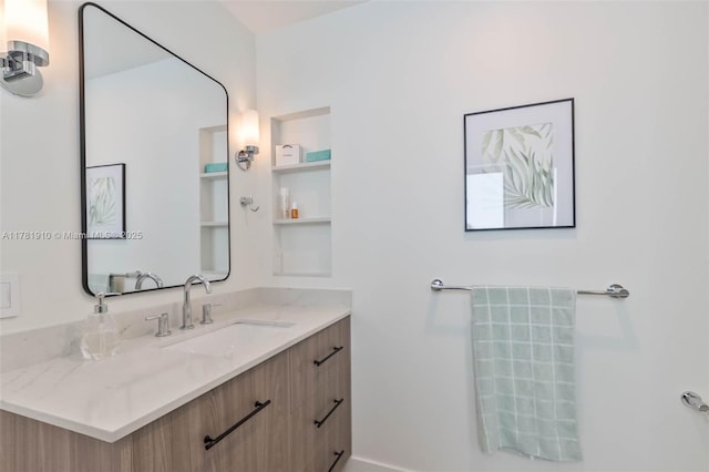 8360 SW 148th Dr, Palmetto Bay, FL 33158 - bathroom featuring built in shelves and vanity