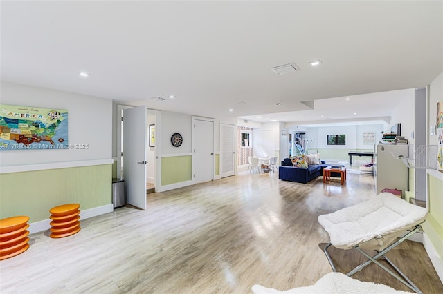 555 Arvida Pkwy, Coral Gables, FL 33156 - living room featuring baseboards, recessed lighting, and light wood-style floors