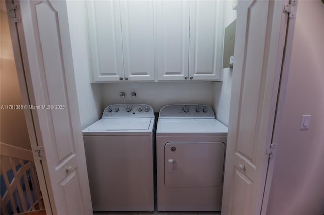 266 Iris Dr, Jupiter, FL 33458 - washroom with washing machine and clothes dryer and cabinet space