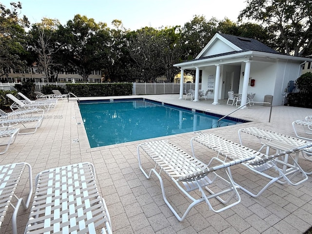 266 Iris Dr, Jupiter, FL 33458 - community pool featuring a patio area and fence