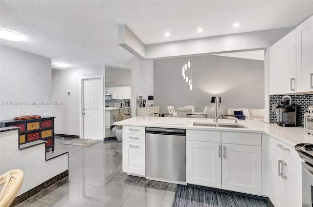 1237 NW 52nd Way, Deerfield Beach, FL 33442 - kitchen with tasteful backsplash, a peninsula, appliances with stainless steel finishes, marble finish floor, and a sink