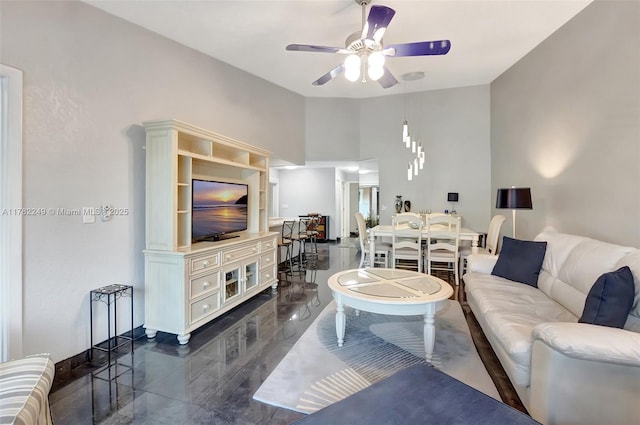 1237 NW 52nd Way, Deerfield Beach, FL 33442 - living area featuring a ceiling fan and lofted ceiling