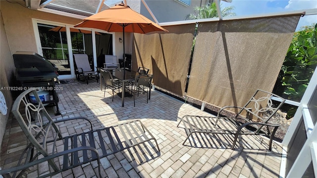 1237 NW 52nd Way, Deerfield Beach, FL 33442 - view of patio featuring a lanai and outdoor dining area