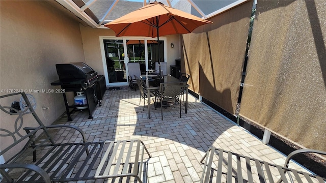 1237 NW 52nd Way, Deerfield Beach, FL 33442 - view of patio with grilling area and outdoor dining area