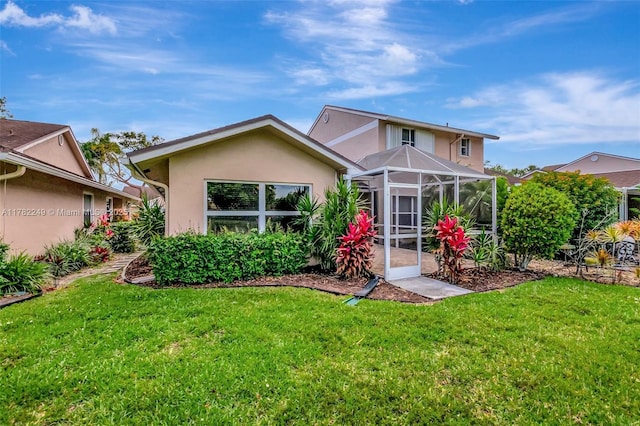 1237 NW 52nd Way, Deerfield Beach, FL 33442 - back of house with a yard, a lanai, and stucco siding