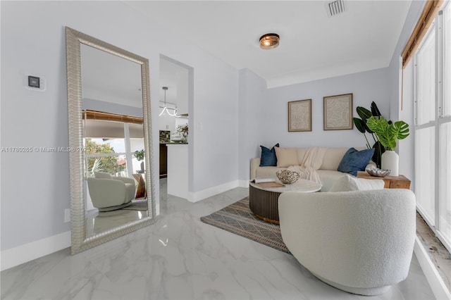 2272 NE 31st St, Lighthouse Point, FL 33064 - living area with marble tiled flooring and baseboards