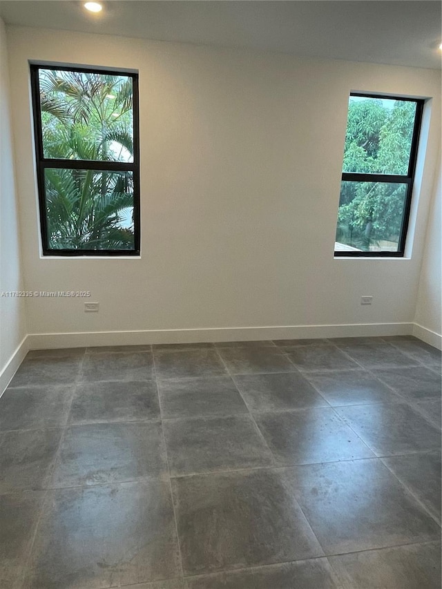 2735-2737 SW 2nd St, Miami, FL 33135 - spare room featuring concrete floors, recessed lighting, and baseboards