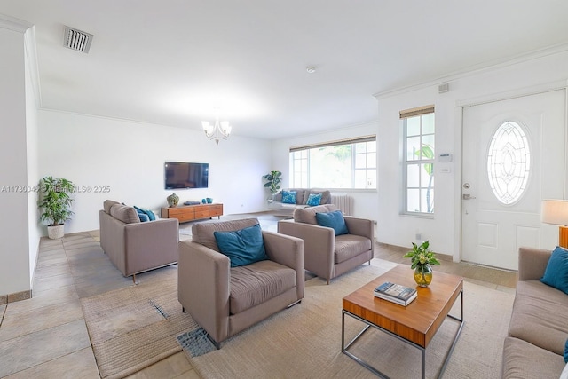 living room with a chandelier and radiator