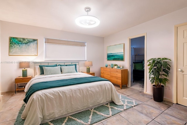 bedroom featuring baseboards