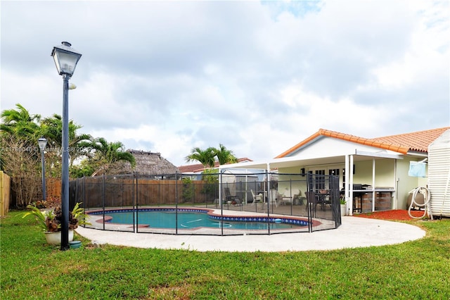 view of swimming pool featuring a patio