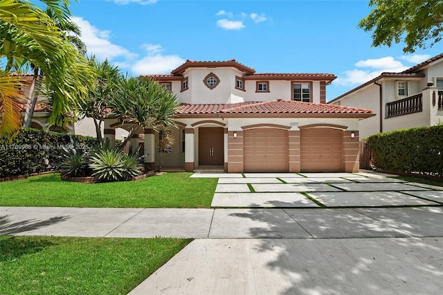 16477 SW 67th Ter, Miami, FL 33193 - mediterranean / spanish-style home with stucco siding, a garage, driveway, a tiled roof, and a front yard
