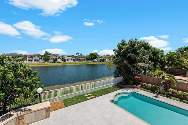 16477 SW 67th Ter, Miami, FL 33193 - view of pool featuring a patio area, a water view, and a fenced backyard