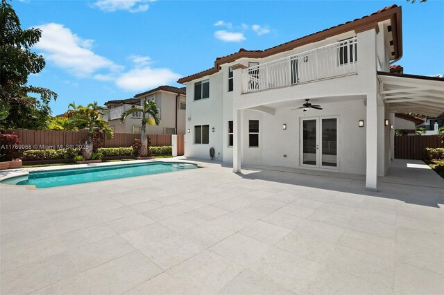 16477 SW 67th Ter, Miami, FL 33193 - view of pool with a patio, fence, and a ceiling fan