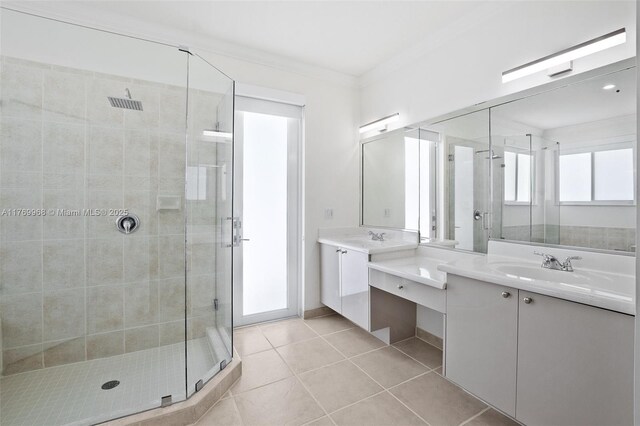 16477 SW 67th Ter, Miami, FL 33193 - kitchen featuring stainless steel dishwasher, a sink, dark countertops, plenty of natural light, and crown molding