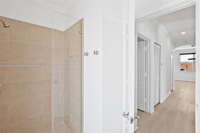 16477 SW 67th Ter, Miami, FL 33193 - full bathroom with ornamental molding, a shower stall, wood finished floors, and baseboards