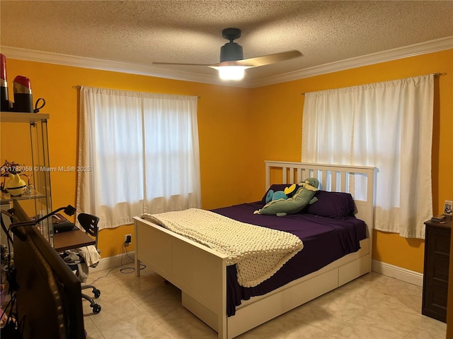 bedroom with baseboards, a textured ceiling, crown molding, and a ceiling fan