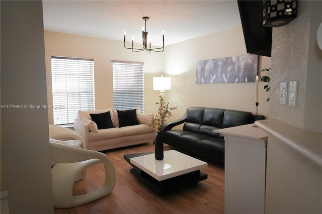 16101 SW 104th Ter, Miami, FL 33196 - living area featuring a notable chandelier and wood finished floors