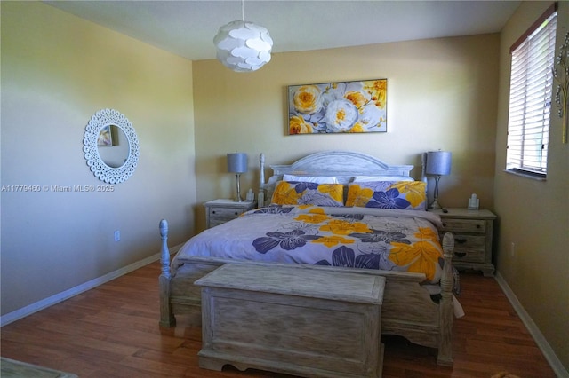 16101 SW 104th Ter, Miami, FL 33196 - bedroom with baseboards and wood finished floors