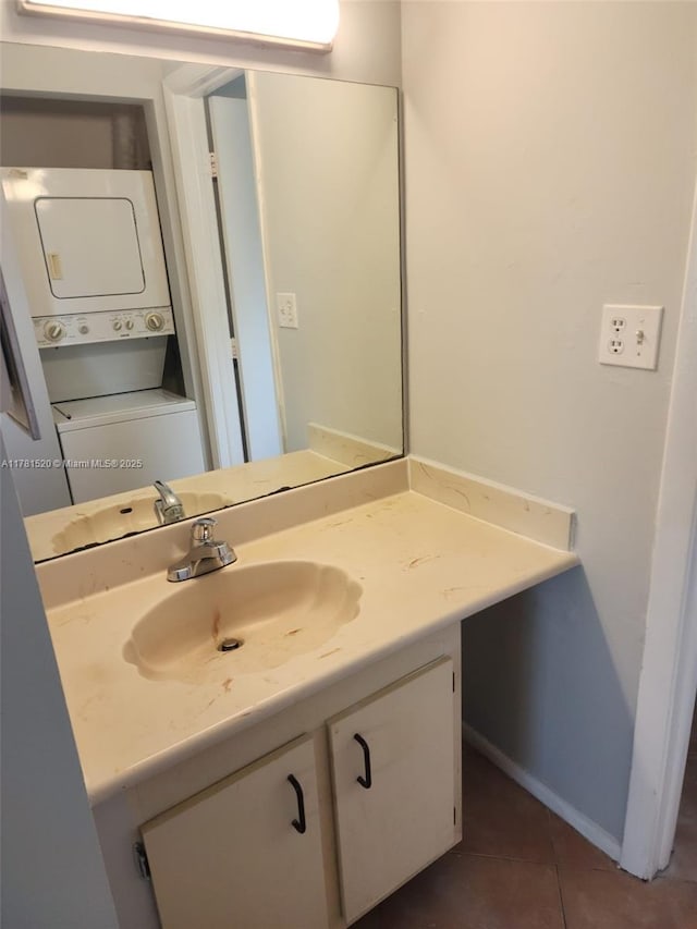 6061 Shakerwood Cir Unit 208, Tamarac, FL 33319 - bathroom with stacked washing maching and dryer, vanity, and tile patterned floors