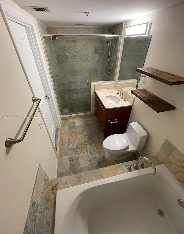 2681 N Flamingo Rd Unit 302S, Sunrise, FL 33323 - full bath with stone finish floor, vanity, visible vents, toilet, and a stall shower