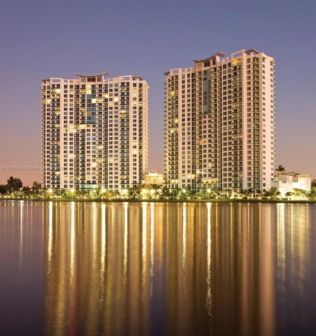 2681 N Flamingo Rd Unit 302S, Sunrise, FL 33323 - property at dusk with a water view and a city view