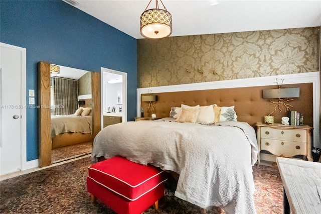 3062 S Oakland Forest Dr Unit 205, Oakland Park, FL 33309 - bedroom with wallpapered walls and a wainscoted wall