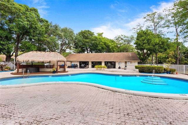 3062 S Oakland Forest Dr Unit 205, Oakland Park, FL 33309 - pool with a patio area, a gazebo, and fence
