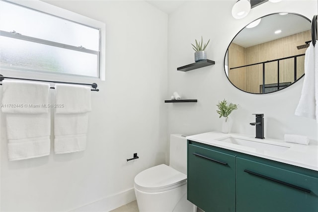 full bathroom featuring toilet and vanity