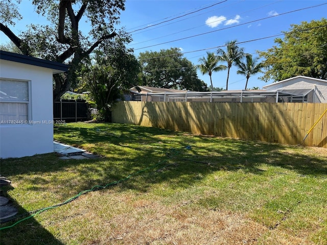 view of yard featuring fence