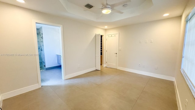 unfurnished room with visible vents, light tile patterned floors, baseboards, ceiling fan, and recessed lighting