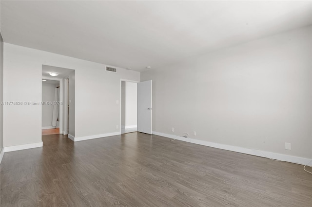 2100 Sans Souci Blvd Unit A1509, North Miami, FL 33181 - spare room with baseboards, visible vents, and dark wood-style floors