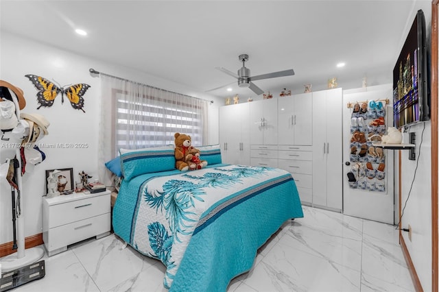bedroom with recessed lighting, marble finish floor, and ceiling fan