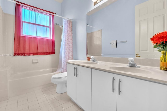 bathroom featuring toilet, shower / bath combination with curtain, a sink, and tile patterned flooring