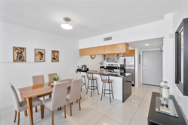 1750 N Bayshore Dr Unit 3106, Miami, FL 33132 - dining area with light tile patterned floors