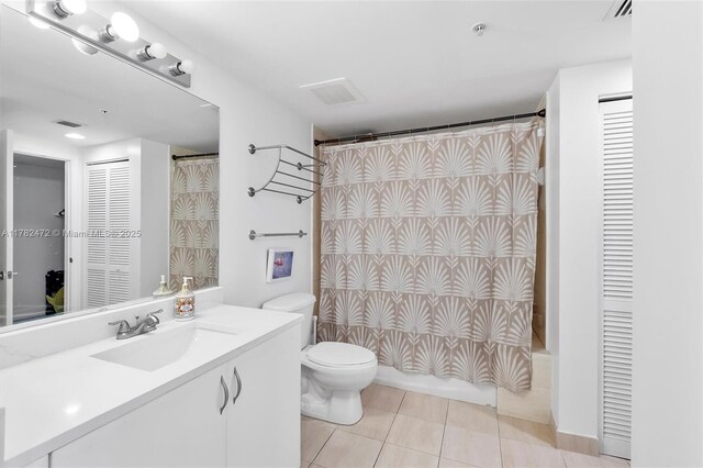 1750 N Bayshore Dr Unit 3106, Miami, FL 33132 - full bath featuring a closet, vanity, tile patterned floors, and shower / tub combo with curtain