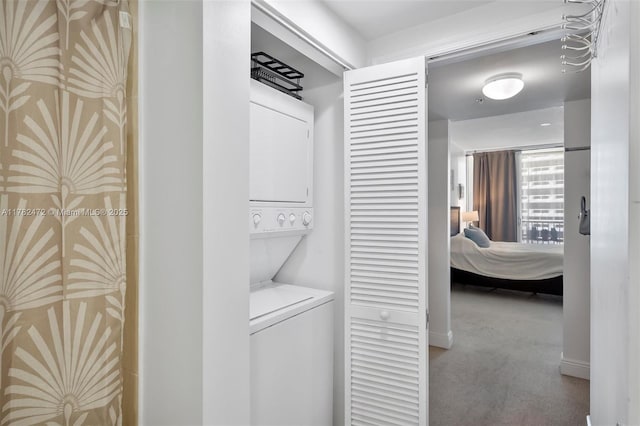 1750 N Bayshore Dr Unit 3106, Miami, FL 33132 - laundry room featuring stacked washer and clothes dryer and carpet floors