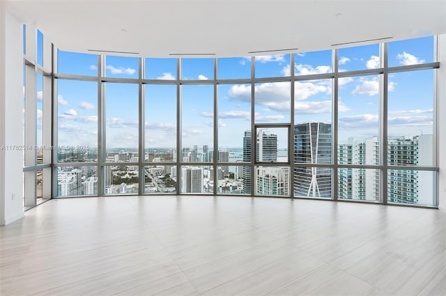 851 NE 1st Ave Ph 5500, Miami, FL 33132 - spare room featuring floor to ceiling windows and a city view