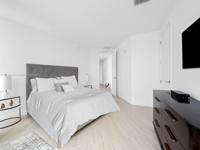 851 NE 1st Ave Ph 5500, Miami, FL 33132 - bedroom featuring light wood-type flooring, visible vents, and baseboards