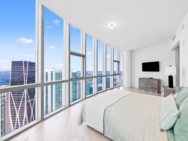 851 NE 1st Ave Ph 5500, Miami, FL 33132 - bedroom with a water view, floor to ceiling windows, multiple windows, and visible vents