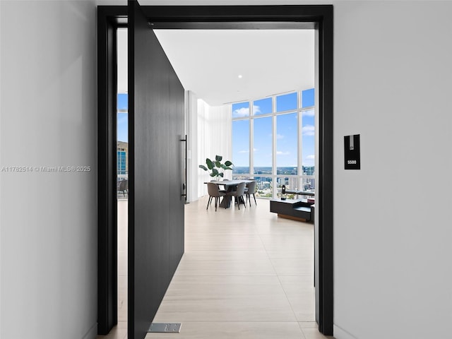 851 NE 1st Ave Ph 5500, Miami, FL 33132 - hallway featuring expansive windows