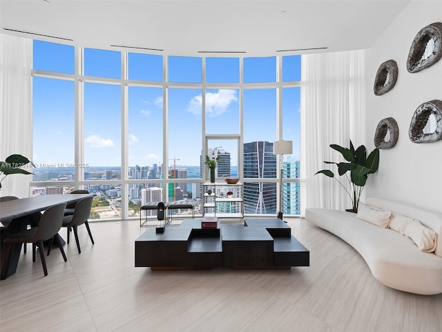 851 NE 1st Ave Ph 5500, Miami, FL 33132 - living room with a wall of windows and a city view